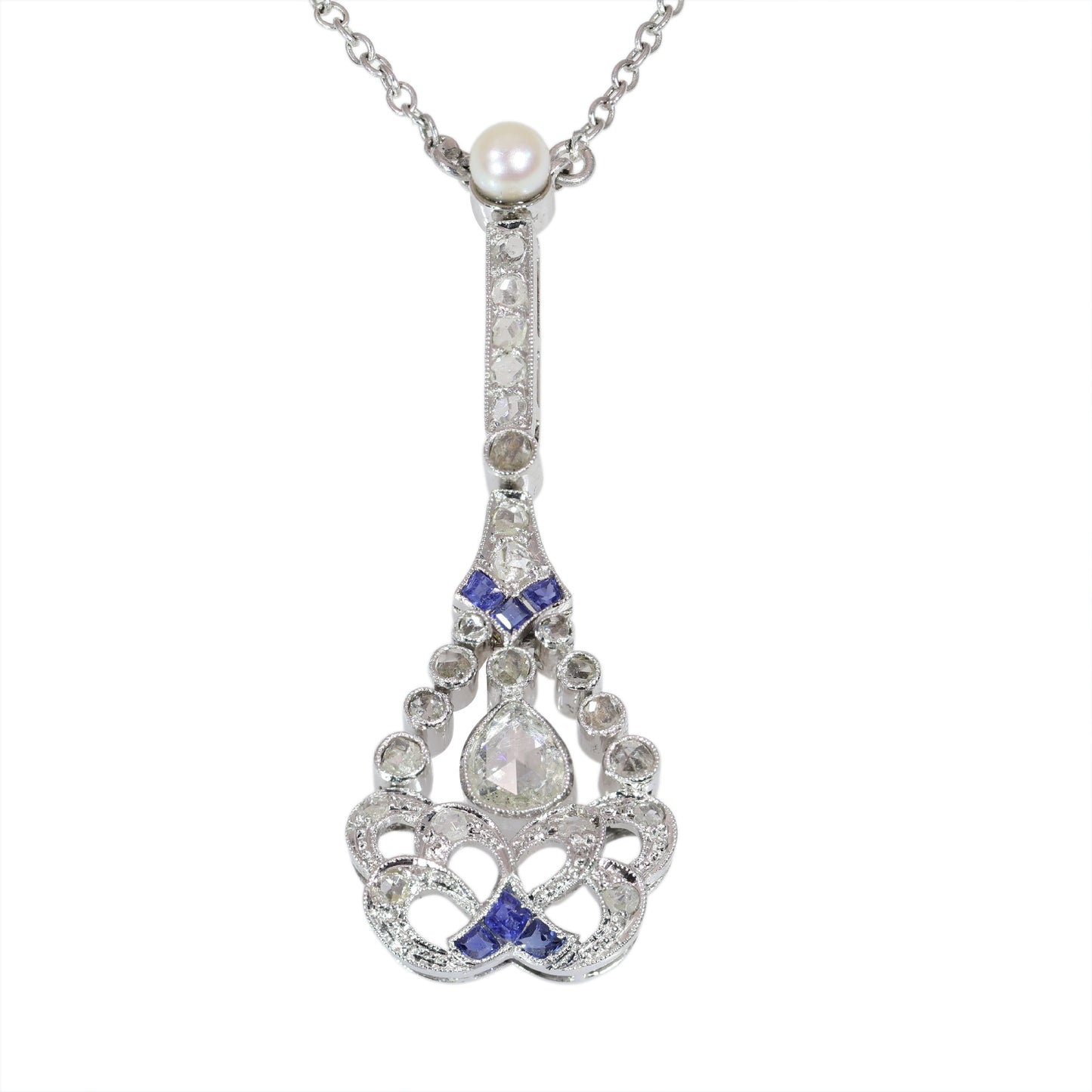 A diamond, sapphire and pearl drop pendant necklace in platinum