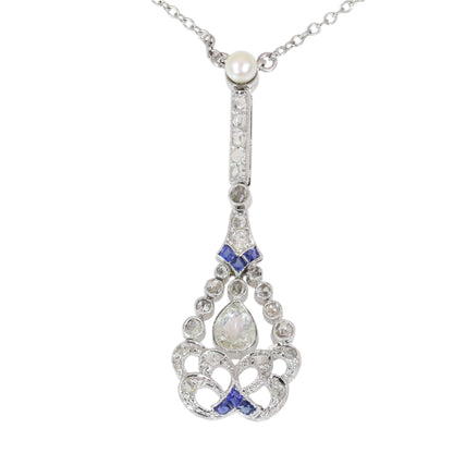 A diamond, sapphire and pearl drop pendant necklace in platinum