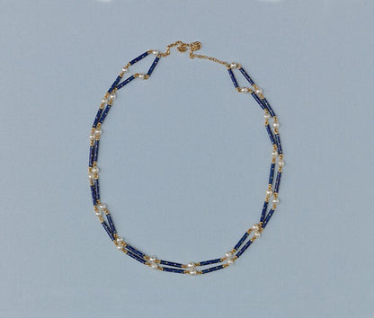Antique Victorian Natural Pearl and Blue Enamel Long Chain Necklace; alternating natural pearls and royal blue enamel on 18ct yellow gold sticks. France, circa 1890.