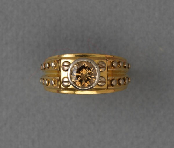 Vintage 1.00ct Fancy Brown Diamond Nail Ring; 18ct yellow gold shank accented with white gold nails, Dutch, Circa 1970.