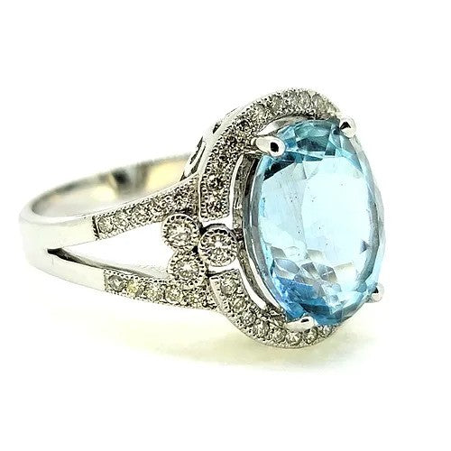 4.63ct Oval Aquamarine and Diamond Cluster Dress Ring