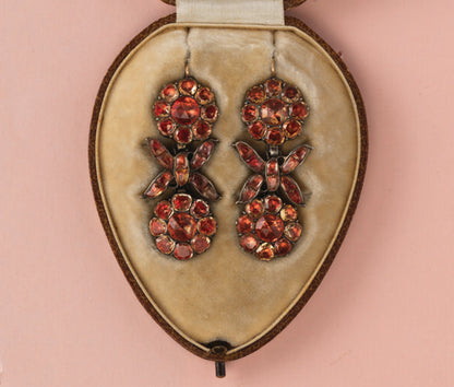 18th Century Imperial Topaz Cluster Drop Earrings, set in silver and backed with foil, decorated with flowers and bows, gold hooks. Portugal, circa 1750.