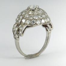 Art Deco French 3.60ct Diamond and Platinum Target Dome Bombe Ring; central 0.50ct round brilliant cut diamond surrounded with 48 brilliant diamonds and diamond set shoulders, 3.60 carat total