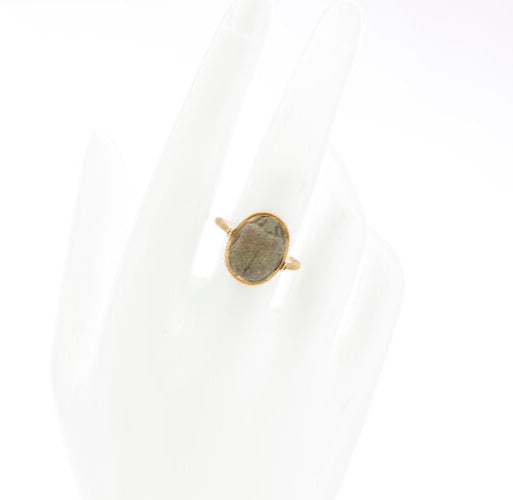 Egyptian Faience Scarab Amulet Reversible Ring; 22ct yellow gold round wire ring with flip bezel holding a faience scarab amulet with cartouche underside