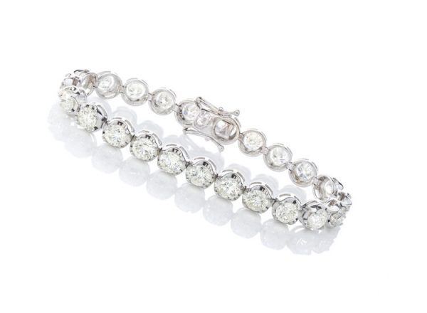 Vintage Diamond Tennis Bracelet, set with 23 round brilliant-cut diamonds, 23.00 carat total, mounted in 18ct white gold. Circa 1970's
