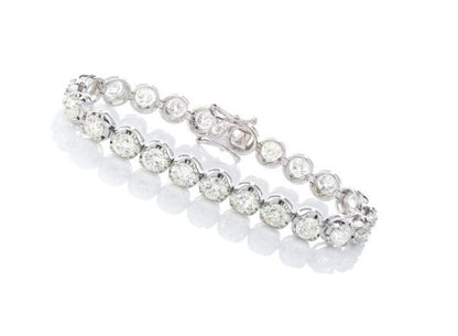 Vintage Diamond Tennis Bracelet, set with 23 round brilliant-cut diamonds, 23.00 carat total, mounted in 18ct white gold. Circa 1970's