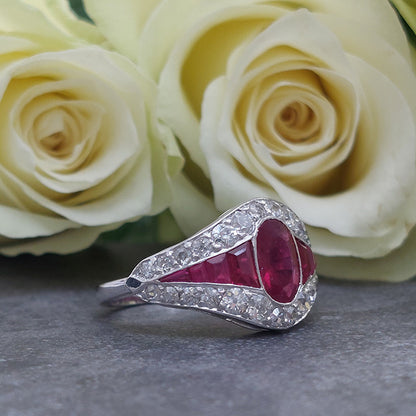 1ct Oval Burma Ruby and Diamond Cluster Engagement Ring
