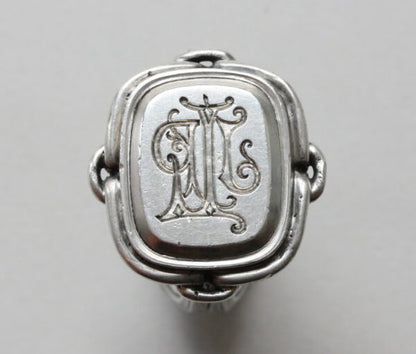 19thC French Neo Renaissance Silver Desk Seal Ring; presse papier ring, quatrefoil bezel set with octahedron diamond, animal mouths to shank, Circa 1870