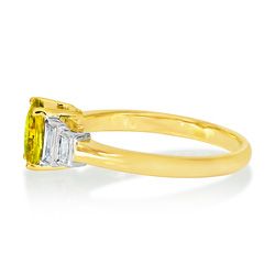 2.41ct Oval Cut Yellow Sapphire Engagement Ring with Baguette Diamond Shoulders in 18ct Yellow Gold