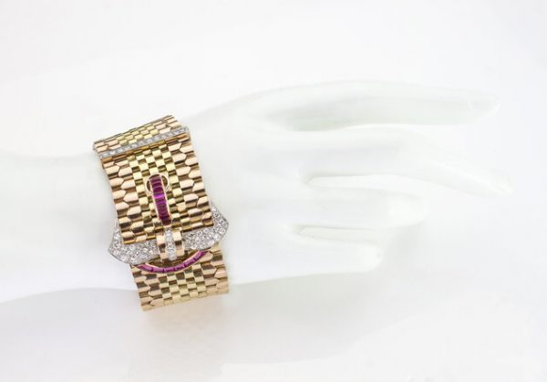 Vintage Tiffany and Co 18ct Gold Belt Buckle Style Bracelet set with rubies and diamonds. Circa 1940s.