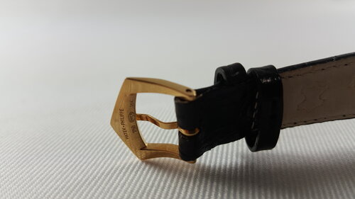 Patek Philippe 5014J Gondolo 18ct Yellow Gold 28mm Manual, black dial, Arabic numerals, small seconds sub-dial at 6, sapphire crystal, leather strap with 18ct yellow gold buckle, Circa 2003, with Original Papers