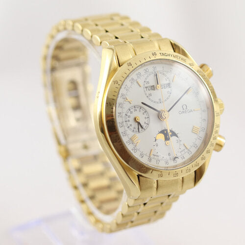 Omega Speedmaster Triple Date Moon Chronograph 18ct Yellow Gold 39mm Watch, white dial, chronograph function, weekday, month, date, moon-phase indicators, sapphire crystal, on an 18ct Yellow Gold bracelet with matching fold-over clasp, with an Omega box.