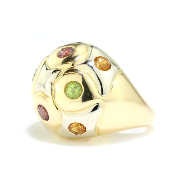 Bvlgari Multi Gemstone and 18ct Gold Domed Cocktail Ring; set with citrine, amethysts and garnets, with original box. Made in Italy, Circa 1990s