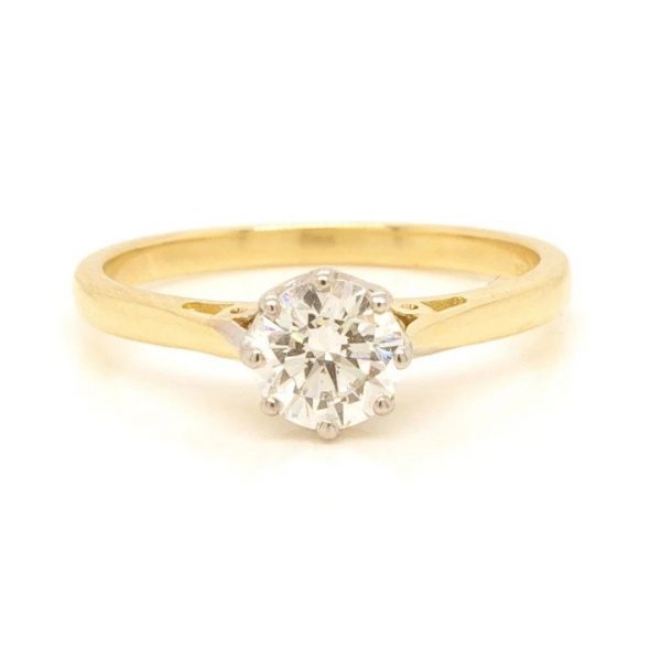 Diamond Solitaire Engagement Ring; 0.60 carat round brilliant-cut diamond, claw set in 18ct yellow gold, colour I, clarity VS2