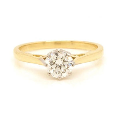 Diamond Solitaire Engagement Ring; 0.60 carat round brilliant-cut diamond, claw set in 18ct yellow gold, colour I, clarity VS2