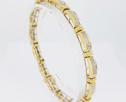 6.00ct Diamond and 18ct Yellow Gold Panel Line Bracelet; An elegant diamond bracelet comprising of diamond set panels, 18ct gold. Diamond total 6 carats