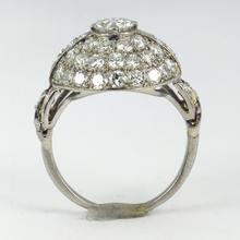 Art Deco French 3.60ct Diamond and Platinum Target Dome Bombe Ring; central 0.50ct round brilliant cut diamond surrounded with 48 brilliant diamonds and diamond set shoulders, 3.60 carat total