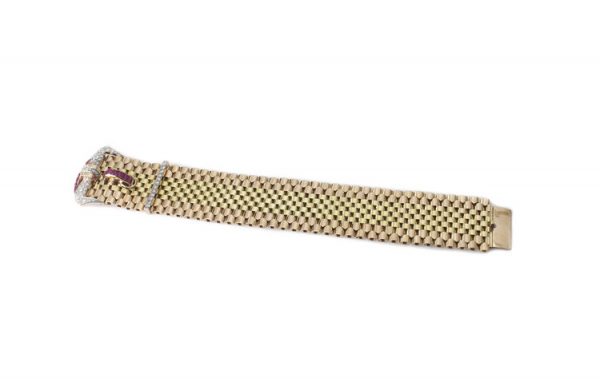 Vintage Tiffany and Co 18ct Gold Belt Buckle Style Bracelet set with rubies and diamonds. Circa 1940s.