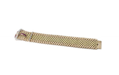 Vintage Tiffany and Co 18ct Gold Belt Buckle Style Bracelet set with rubies and diamonds. Circa 1940s.