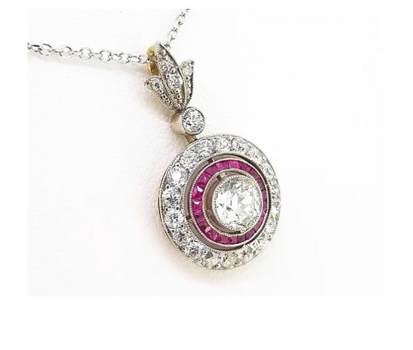 Diamond and Ruby Target Cluster Pendant, 5.00 carat total, brilliant-cut diamond surrounded by calibre-cut rubies and diamonds, diamond-set bale, 18ct white gold