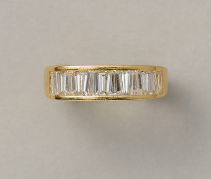 Channel Set Baguette Cut Diamond Ring, 1.51 carat total, modern 18ct yellow gold rounded square-shaped ring channel-set with twelve tapered baguettes totalling 1.51 carats