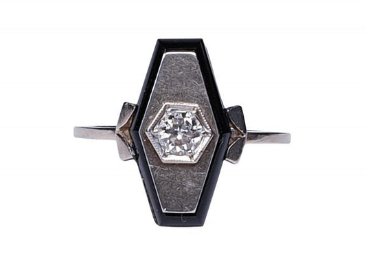Art Deco French Old Cut Diamond and Onyx Lozenge Plaque Ring; hexagonal ring with central 0.25ct old cut diamond on a matt ground with a fine onyx border. Set in white gold, Circa 1925