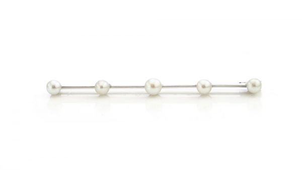 Boucheron Art Deco Platinum Bar Brooch set with five natural freshwater pearls. Made in France, Circa 1920s. Comes in original Boucheron antique box