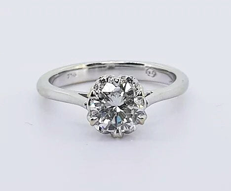 Diamond Solitaire Engagement Ring; A traditional diamond engagement ring featuring a 0.85 carat round brilliant-cut diamond, claw-set, in 18ct white gold.