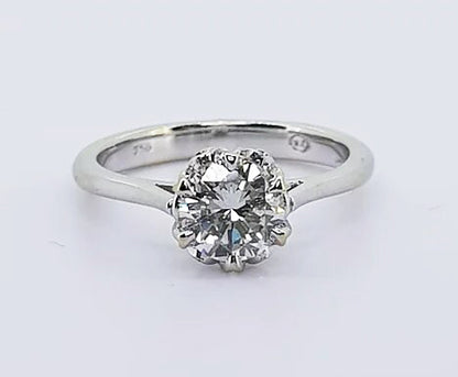 Diamond Solitaire Engagement Ring; A traditional diamond engagement ring featuring a 0.85 carat round brilliant-cut diamond, claw-set, in 18ct white gold.