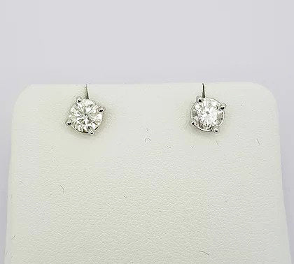 Pair of Diamond Solitaire Stud Earrings, 1.01 carat total, four-claw set, 18ct white gold, post and butterfly fittings, colour H, clarity SI1