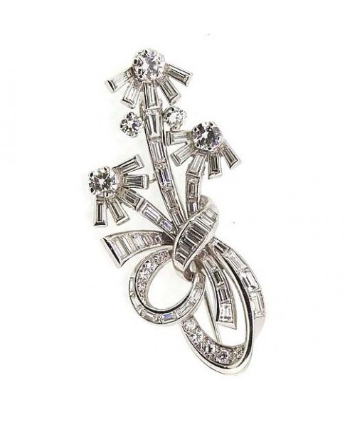 Vintage 1950's Diamond Floral Spray Brooch, 3.50cts, in Platinum; An unusual vintage diamond floral brooch set with baguette and brilliant-cut diamonds.