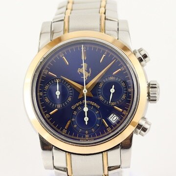Girard Perregaux Ferrari 8020 Steel and Gold 38mm Automatic Chronograph Gents Watch; with gold bezel, blue dial, chronograph and date functions and sapphire crystal, on a matching steel and gold bracelet with hidden clasp