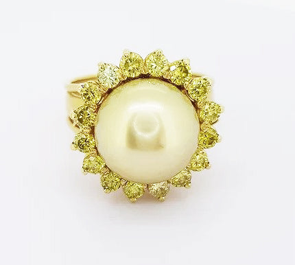 Golden South Sea Pearl and 2ct Fancy Yellow Diamond Cluster Ring; 13mm golden South Sea pearl set within a border of fancy yellow diamonds, 18ct yellow gold