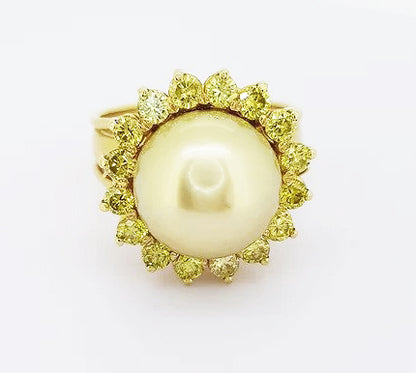 Golden South Sea Pearl and 2ct Fancy Yellow Diamond Cluster Ring; 13mm golden South Sea pearl set within a border of fancy yellow diamonds, 18ct yellow gold