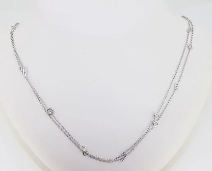 Mixed Cut Diamond Set Chain Necklace; A 36 inch 18ct white gold chain necklace, bezel set with mixed cut diamonds, 1.32 carat total