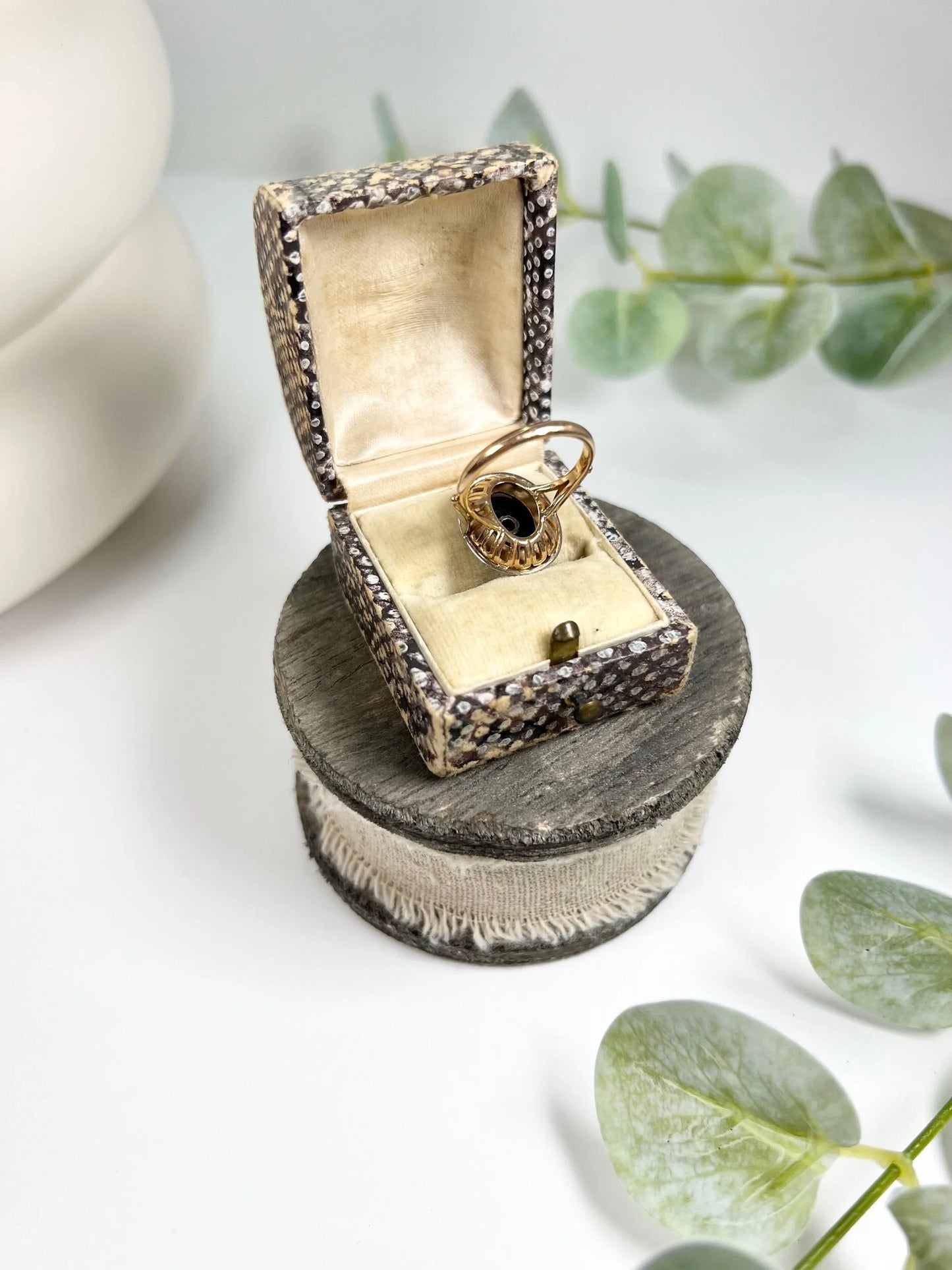 Art Deco 18 Carat Two Colour Gold Oval Onyx and Diamond Halo Ring, Circa 1920