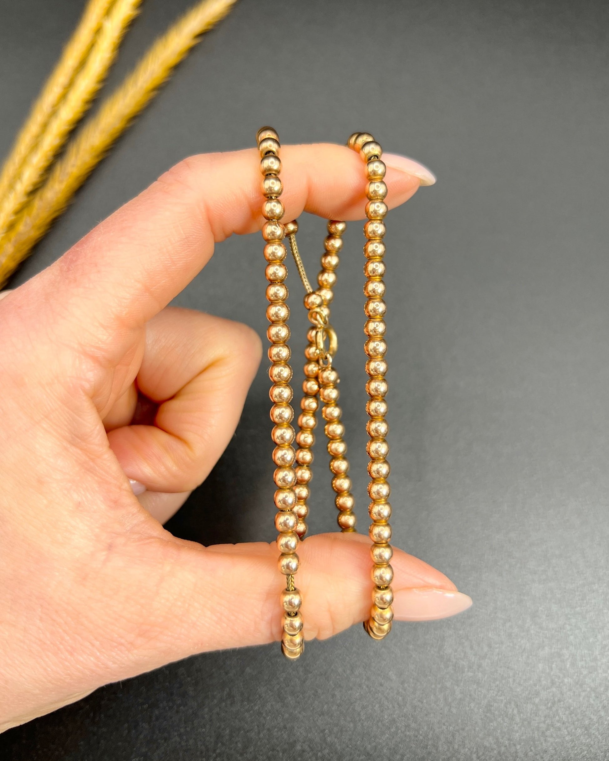 Edwardian 9 Carat Rose Gold Marseille Gold Ball Necklace, Circa 1910