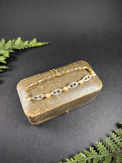 Antique Diamond And Pearl Bracelet In 18 Carat Yellow Gold And Platinum