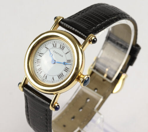 Cartier Diabolo 18ct Yellow Gold 27mm MidSize Ladies Quartz Watch, Ref 1440, white dial, Roman numerals, blue steel Breguet hands, blue cabochon gem set crown and lugs, black leather strap with plated buckle
