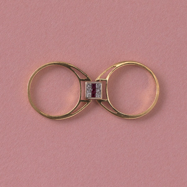 Vintage Princess Cut Diamond Reversible Ring with Sapphires or Rubies; once side set with six princess-cut sapphires in two rows flanking a line of princess-cut diamonds in the middle, the other side set with six-princess cut diamonds in two rows flanking a line of princess-cut rubies, in 18ct gold, Italy, Circa 1980