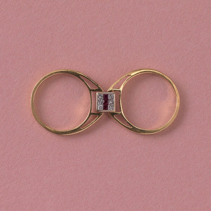 Vintage Princess Cut Diamond Reversible Ring with Sapphires or Rubies; once side set with six princess-cut sapphires in two rows flanking a line of princess-cut diamonds in the middle, the other side set with six-princess cut diamonds in two rows flanking a line of princess-cut rubies, in 18ct gold, Italy, Circa 1980