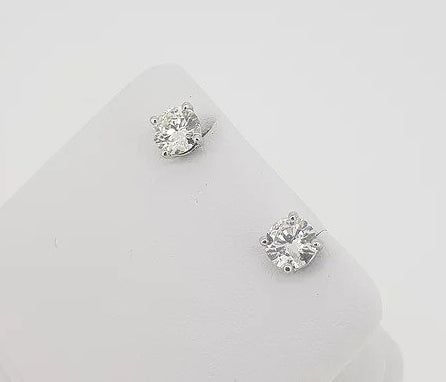 1.45ct Diamond Single Stone Stud Earrings; brilliant-cut diamonds, 1.45 carat total, four-claw set, 18ct white gold, H colour, SI1 clarity