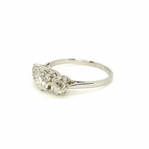 Old Cut Diamond Three Stone Ring; classic trilogy ring set with three old-cut diamonds, 1.00 carat total, claw set, mounted in platinum.