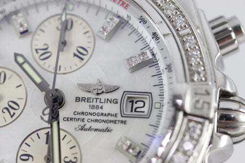 Breitling Chronomat Evolution Diamond 44mm Stainless Steel Automatic, A13356, white mother of pearl dial, factory set diamond hour markers and bezel, blue Breitling crocodile leather strap with Breitling buckle, With Breitling box and papers