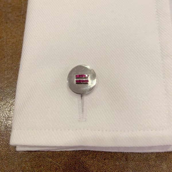 Cartier Vintage Ruby and Platinum Dress Set; comprising a pair of cufflinks, four buttons and two studs set with calibre-cut rubies, in original fitted case, Signed and numbered, Circa 1950