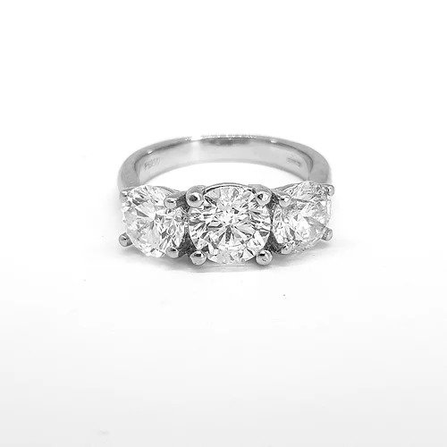 Three Stone Diamond Ring; 3.36 carat total, featuring three round brilliant-cut diamonds, claw set and mounted in platinum