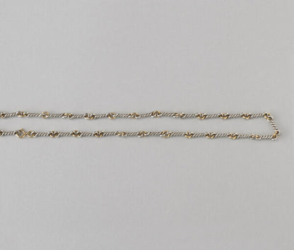 Chaumet Vintage 18ct Yellow Gold and Silver Chain; gold round links alternated with twisted silver links. Signed and numbered, Circa 1970