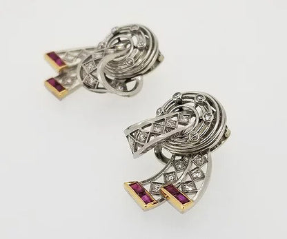 Vintage Diamond, Platinum and Ruby Clip On Earrings, openwork bow design, set with diamonds throughout and accented with rubies. Circa 1940.
