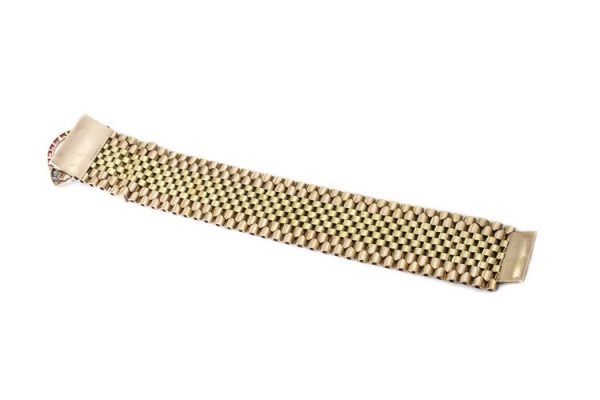 Vintage Tiffany and Co 18ct Gold Belt Buckle Style Bracelet set with rubies and diamonds. Circa 1940s.