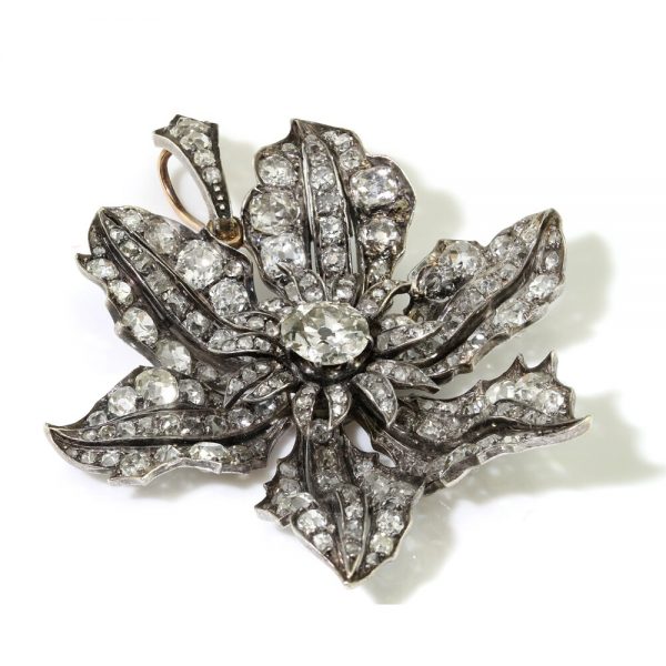 Antique Victorian Old Cut Diamond Flower Pendant, 9 carat total, in silver and 15ct gold, Circa 1840s